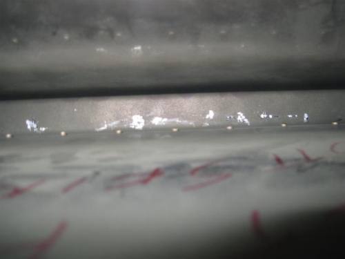 Primer on the inside spar chipped from the bucking bar.