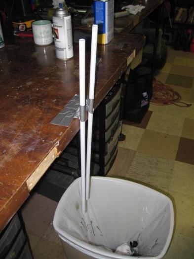 The smaller pushrods draining and drying.