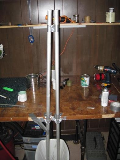 The larger pushrods draining, using an antigravitational support, aka duct tape.