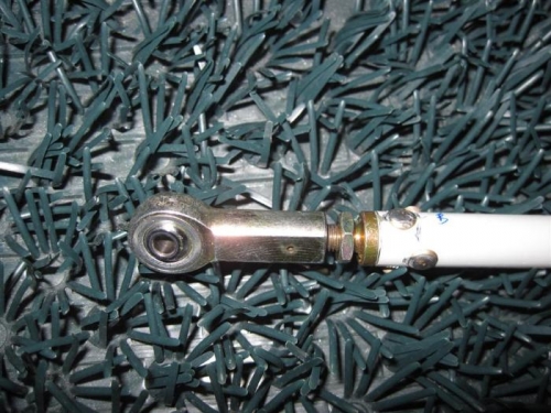One of the rod ends riveted in place.  A couple weren't all that pretty, but they are in shear only.