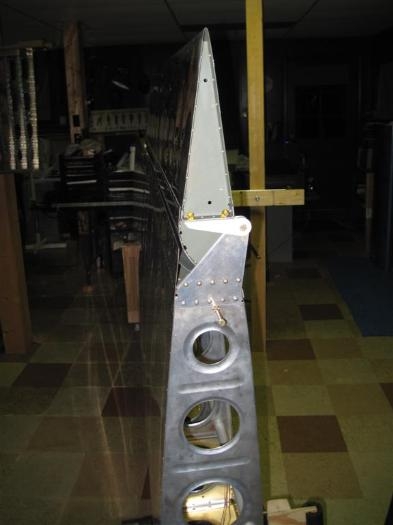 The left aileron located in the neutral position.