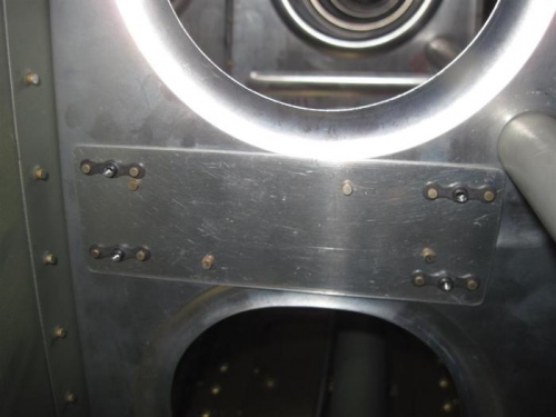 Backing plate on the rib to support the pitot control unit.