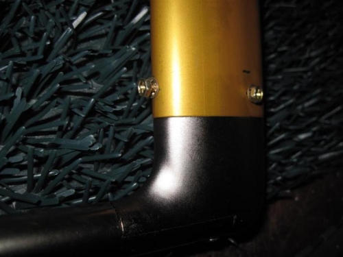 Screws and lock washers in place on the mast.