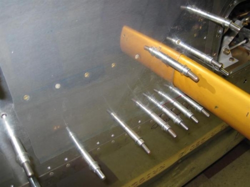 Row of rivets that hold the stiffener in place.  It works.