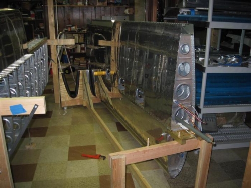 Left wing in the cradle with help from NGFIIDWHAI (Never gonna fly in it, don't wanna hear about it).