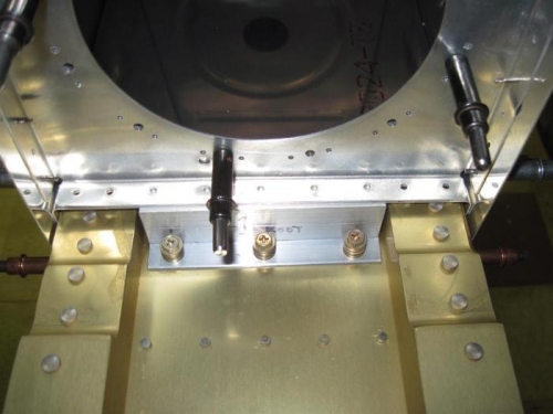 New attach angle in place, washers are to keep the screw from going all the way through the nutplate.