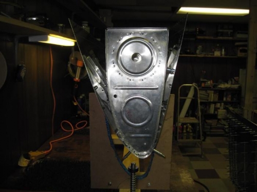 Starting to cleco the tank ribs to the skin, using the jig as an aid.