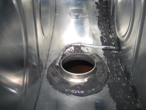 Fuel filler neck fitting in place and gunked up all over.