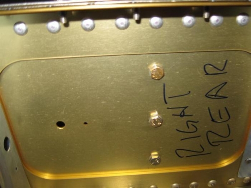 Tank attach angle to spar bolts torqued in place