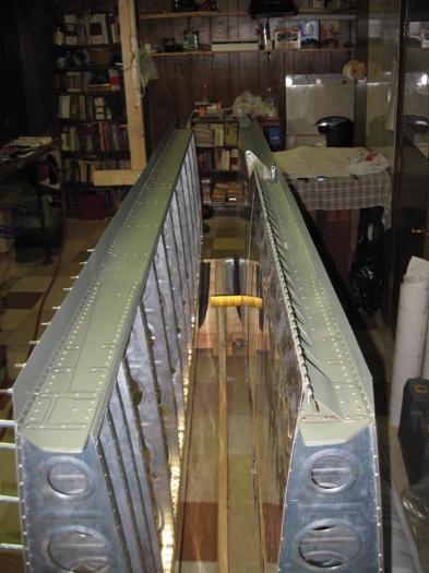 Wings in the cradle, but too close to work on the inside of the right wing. (Left in the picture)