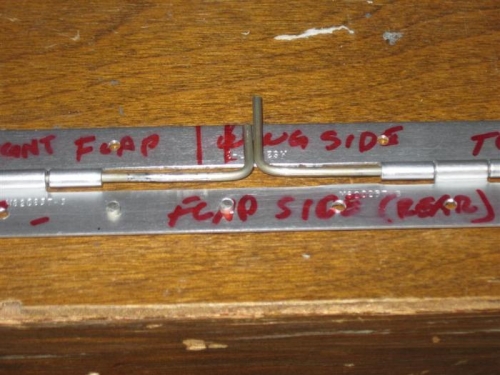 Old hinge with too many loops cut out.