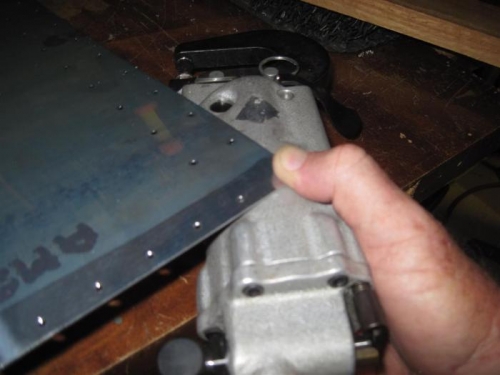 The outer radius of the rivet squeezer looked about right, so I bent it a little more.