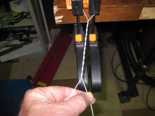 Making a twisted pair of wires the old fashioned way, should have done it this way to start with.