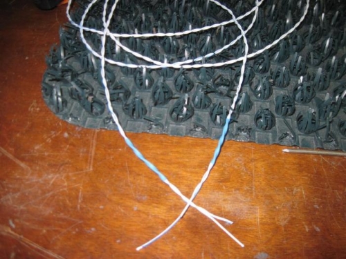 Finished twisted pair, with a little heat shrink tubing to secure the ends in place.