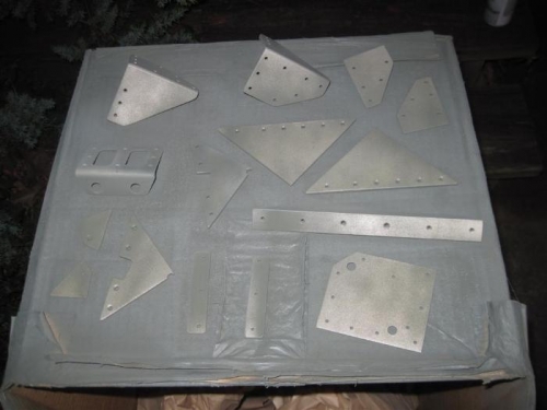 Firewall aluminum parts being primed before reassembly.