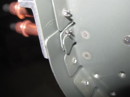 The tab with a notch where the hole should be.