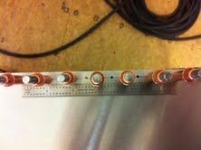 Rivet holes between factory rivet locations (clecoed)