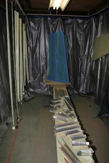 Primed Parts Hanging in my Garage Paint Booth