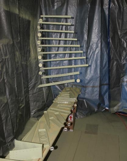 Primed Parts Hanging in my Garage Paint Booth