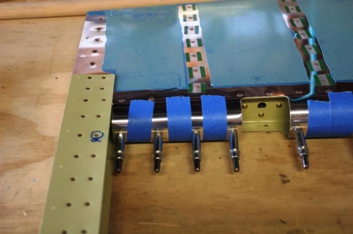 Using Blue Painters Tape to Secure the Rolled Leading Edge