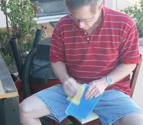 Using 320 Grit Sandpaper to Smooth Landing Light Lens Edges