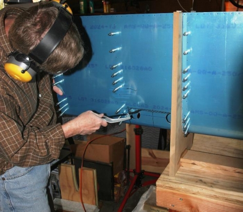 Using a Hacksaw to Cut the Lower Surface for the Landing Light Cutout
