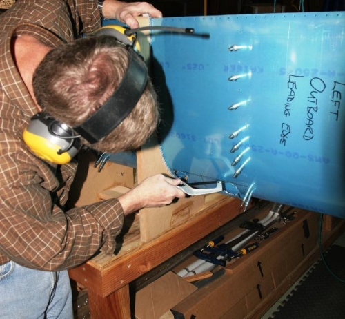 Using a Hacksaw to Cut the Upper Surface for the Landing Light Cutout