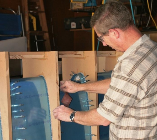 Using Emery Cloth to Finish the Edges of the Landing Light Cutout after Filing