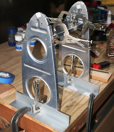 Ribs, Outboard and Inboard Brackets, and Mounting Plate on the Bench