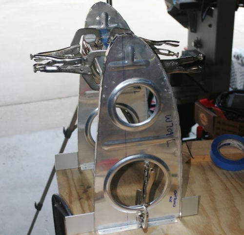 Ribs, Outboard and Inboard Brackets, and Mounting Plate on the Bench