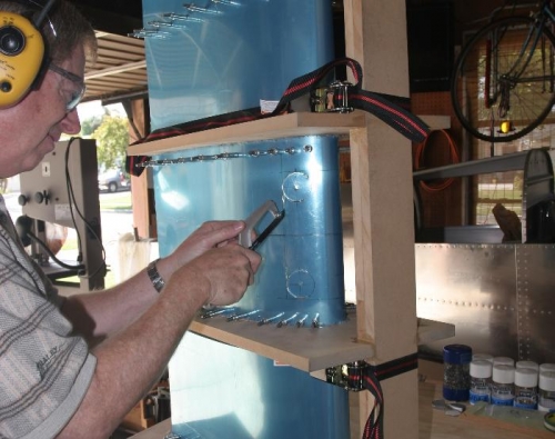 Using a Hack Saw to Cut the Edge Between the Corners