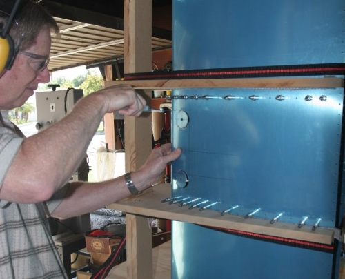 Using a Hack Saw to Cut the Edge Between the Corners