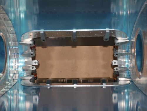 Using Side Clamps to Locate the Landing Light Lens Frame