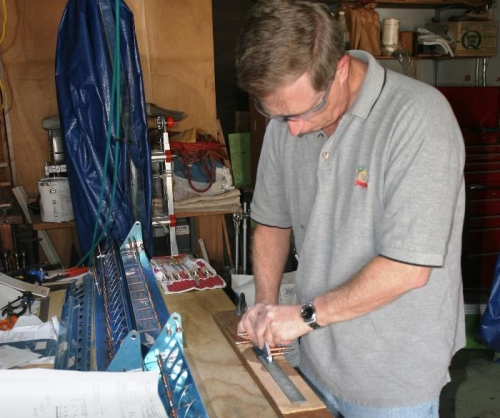 Finsihing the Aileron Brackets with my VIxen File in the Homemade Frame
