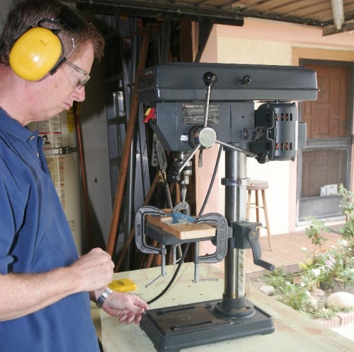 Using Drill Press with Unibit Tool to Drill Initial Holes