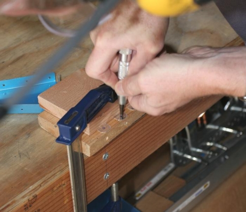 Using a Center Punch to Keep Drill Bit from Walking