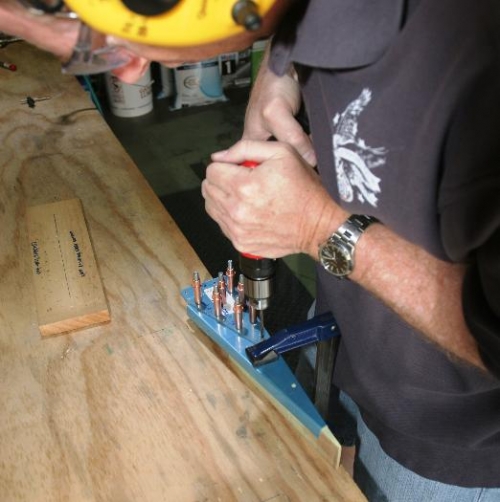 Drilling Pilot Hole Using Flap Drive Bracket as Guide