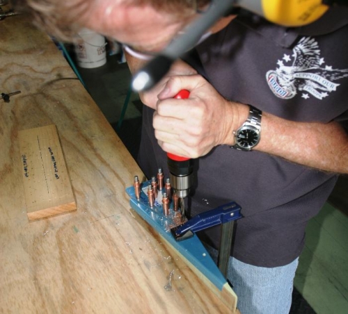 Opening Hole in Flap Drie Bracket and Inboard Rib to Final Size