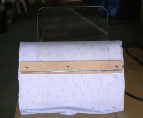 Plexiglas Retainer Installed on Form After Flannel is Stapled in Place