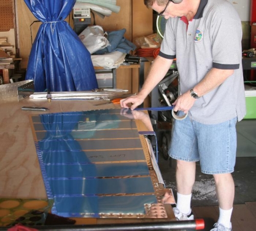 Applying Tape to Rudder Leading Edge Prior to Rolling