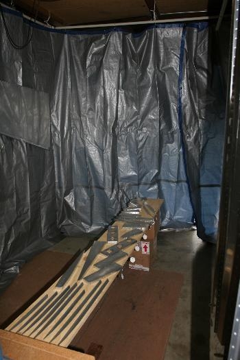 Cleaned Parts Hanging in Paint Booth