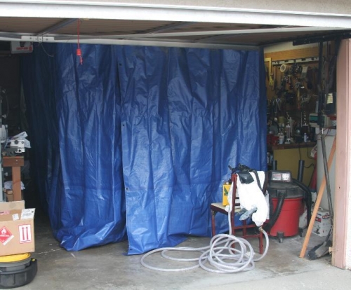 Paint Booth in Garage Made From Plastic Tarps