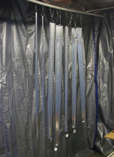 Cleaned Empenage Parts Hanging in Paint Booth