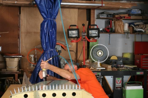 Henry Takes a Turn at the Pneumatic Rivet Squeezer