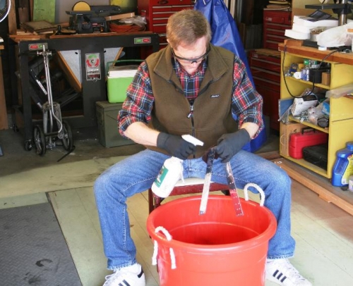 Spraying Prekote onto Parts