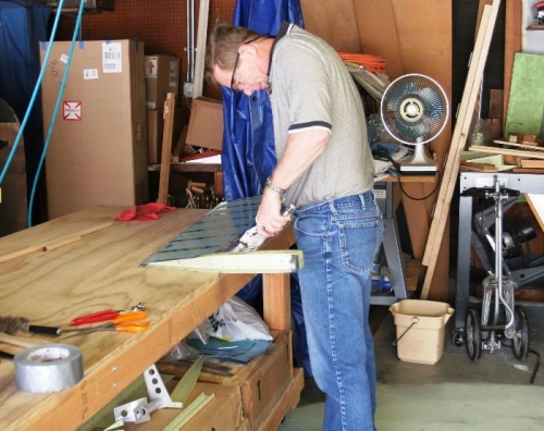 Rolling the Right Elevator Leading Edge with a Dowle and Vice Grips