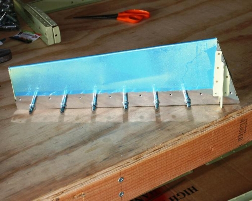 Riveting the Left Elevator Trim Tab