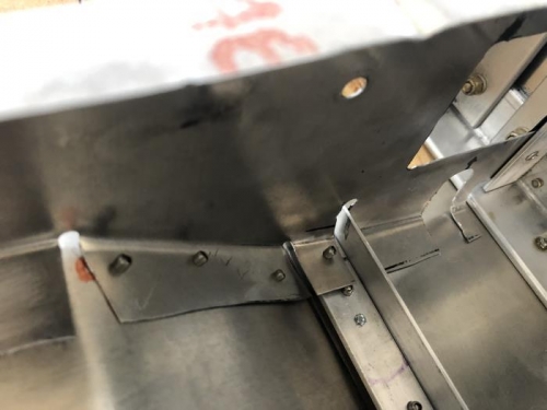 inspecting under side of seam support angle