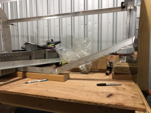 Left lower longeron in place between center section and firewall.