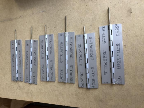 aileron hinges drilled for safety wire